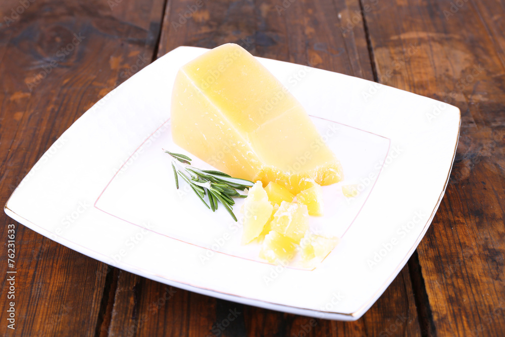 Parmesan cheese with sprig of rosemary