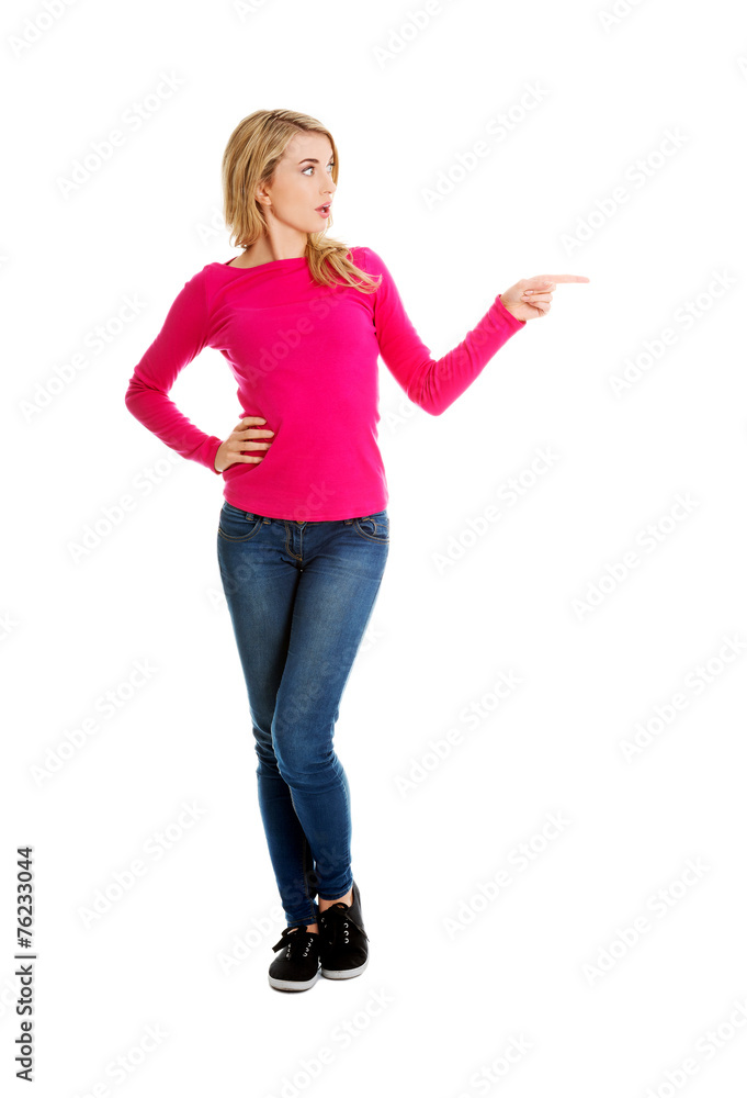 Casual woman presenting a copyspace. Casual woman presenting a copyspace.