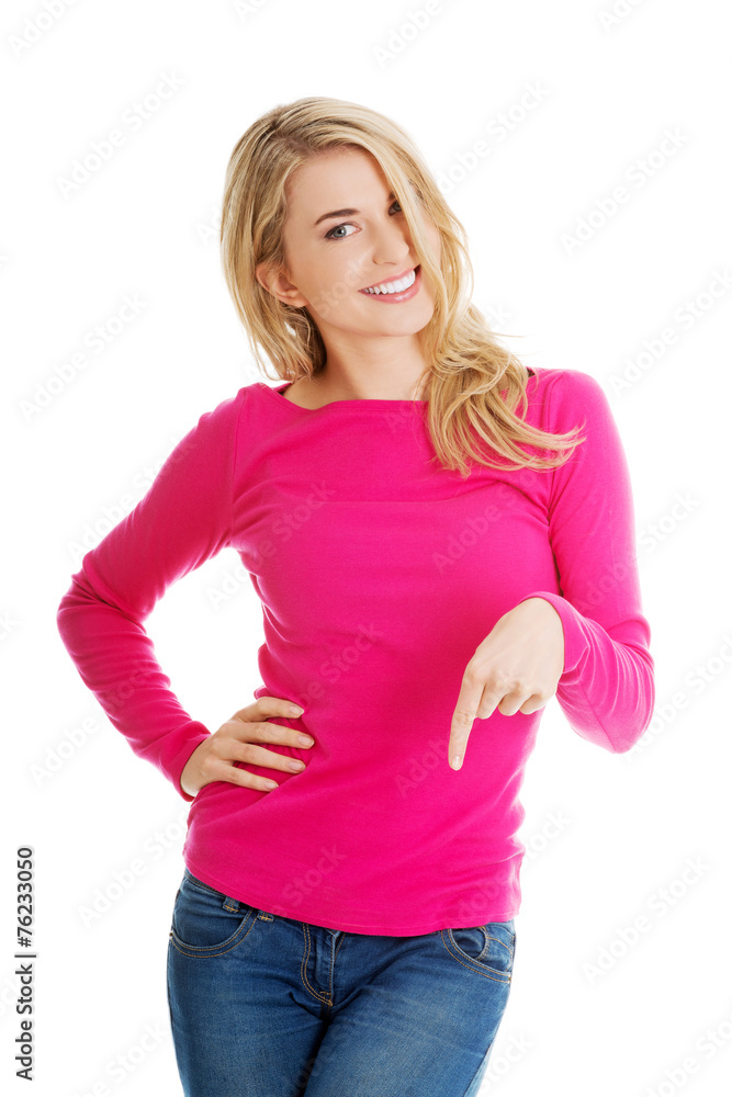 Fototapeta premium Casual woman presenting a copyspace.