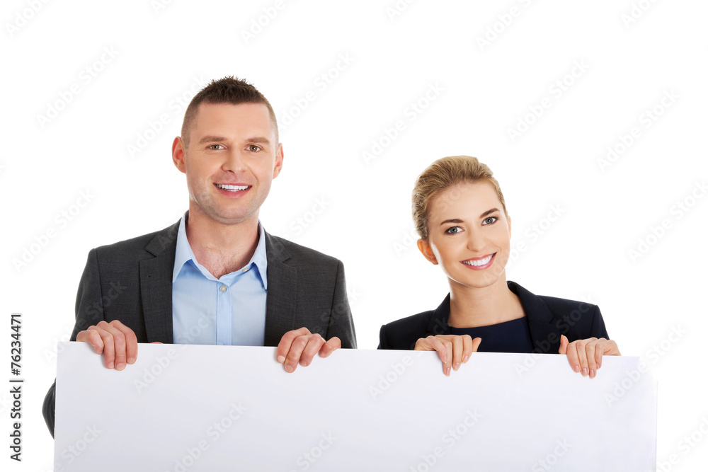 Business team with a banner Business team with a banner