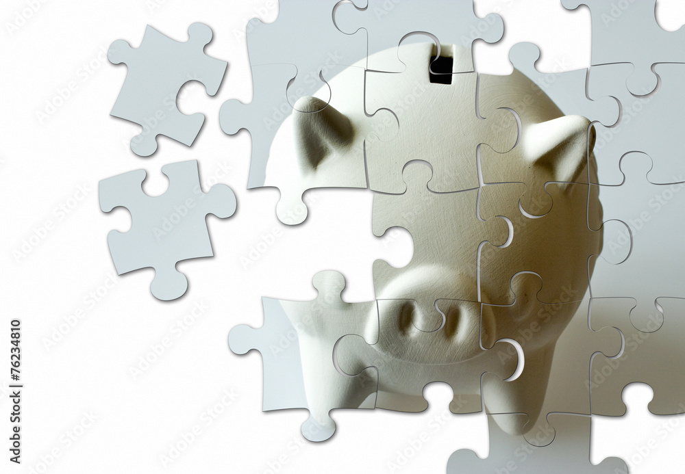 piggy bank made of puzzle - economy and finance piggy bank made of puzzle - economy and finance