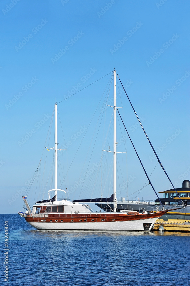 Vintage wooden yacht over harbor pier, Odessa, Ukraine
