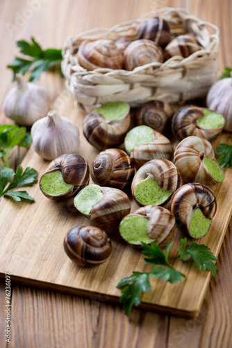 Fototapeta Naklejka Na Ścianę i Meble -  Bourgogne snails with garlic butter, close-up