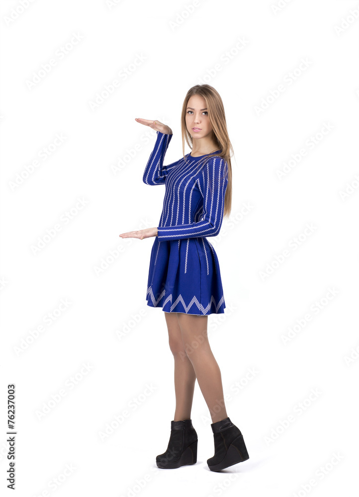 Young lady shows size or length of something with her hands Young lady shows size or length of something with her hands