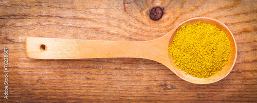  curry powder spices on spoons