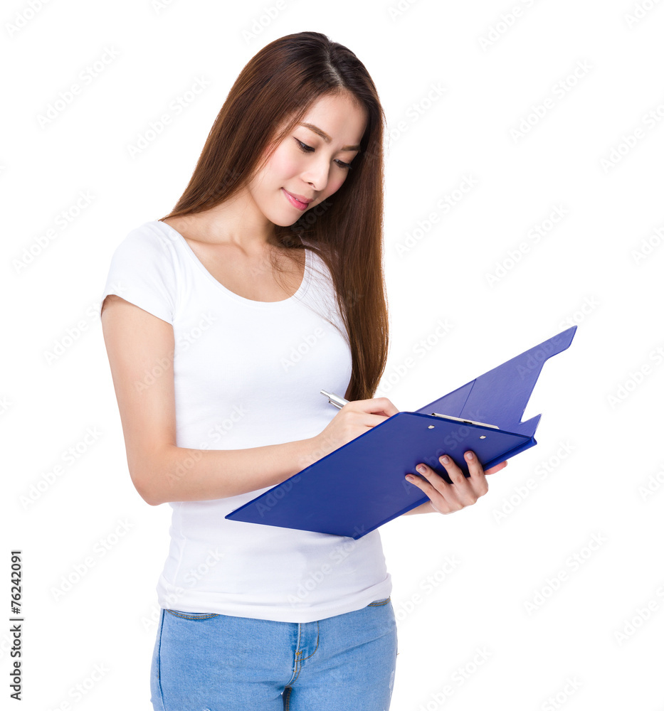 Woman write on clipboard Woman write on clipboard