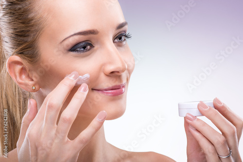 Woman with face cream