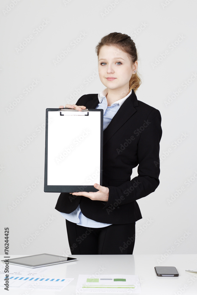 businesswoman showing blank paper sheet businesswoman showing blank paper sheet