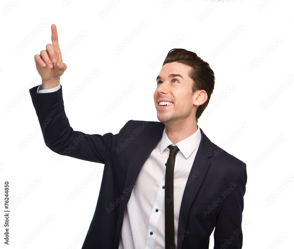 Smiling young business man pointing finger Smiling young business man pointing finger