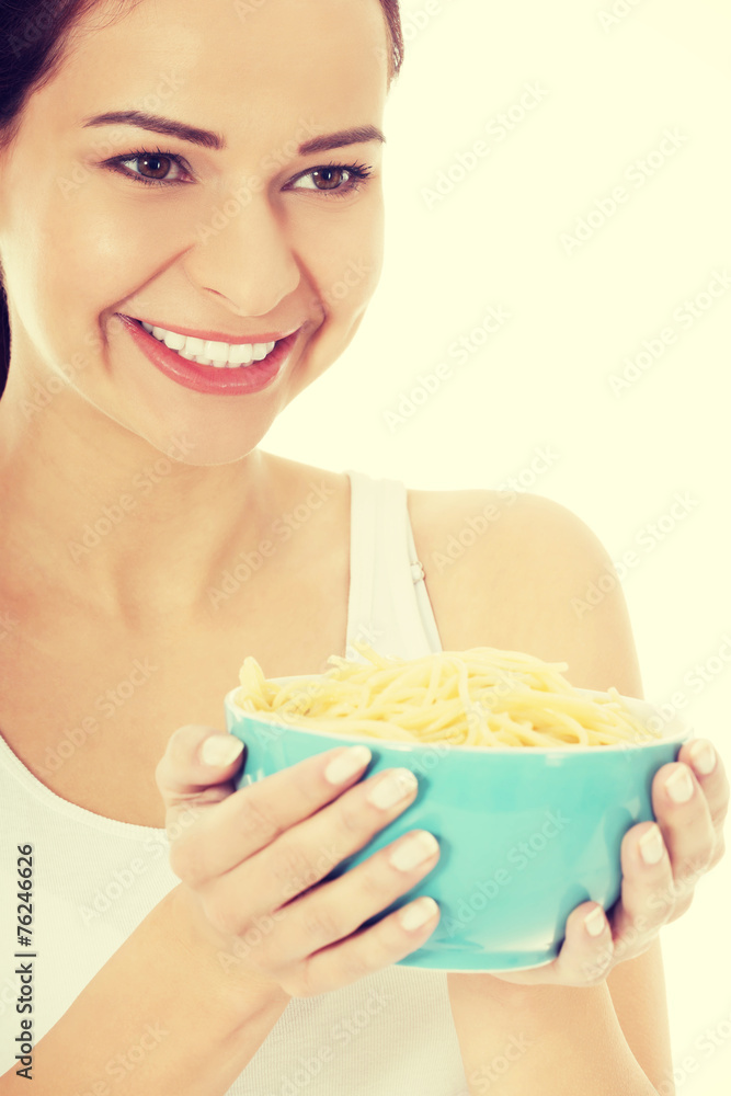 Young beautiful woman with raw pasta. Young beautiful woman with raw pasta.