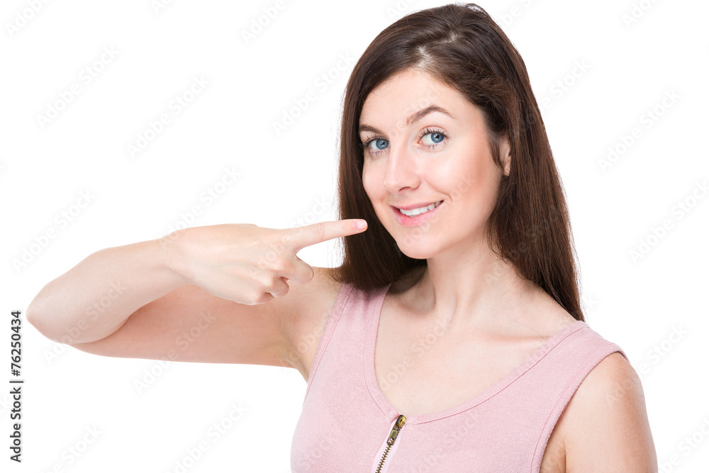 Woman with finger point to her teeth Woman with finger point to her teeth