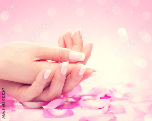 Hands spa. Manicured female hands, soft skin, beautiful nails