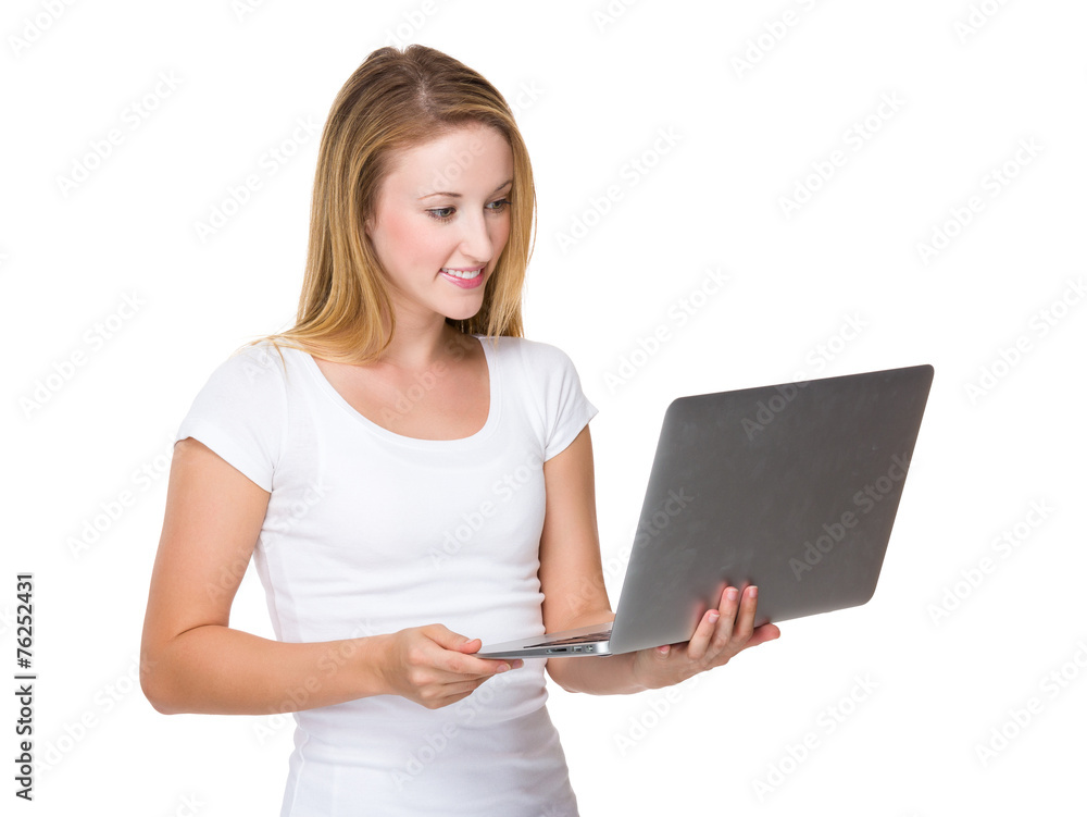 Caucasian Woman use of portrable computer Caucasian Woman use of portrable computer