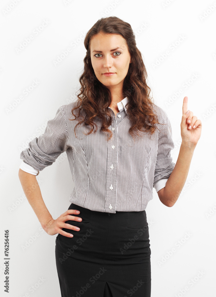 Image of businesswoman pointing with her finger up to empty copy Image of businesswoman pointing with her finger up to empty copy