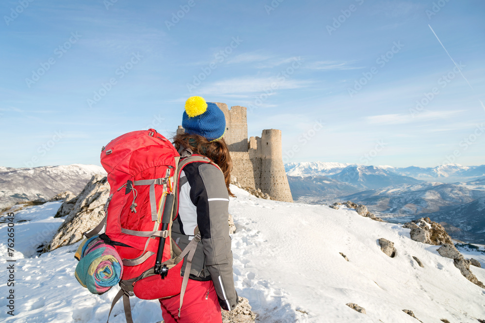 Hiker on the trail to Rocca Calascio, Abruzzo, Italy