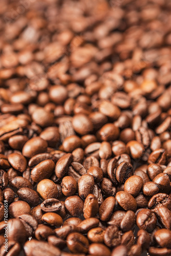 Closeup Background Made of Heap of Roasted Coffee Beans.