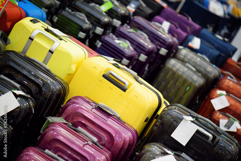 Sale of suitcases of different sizes and colors