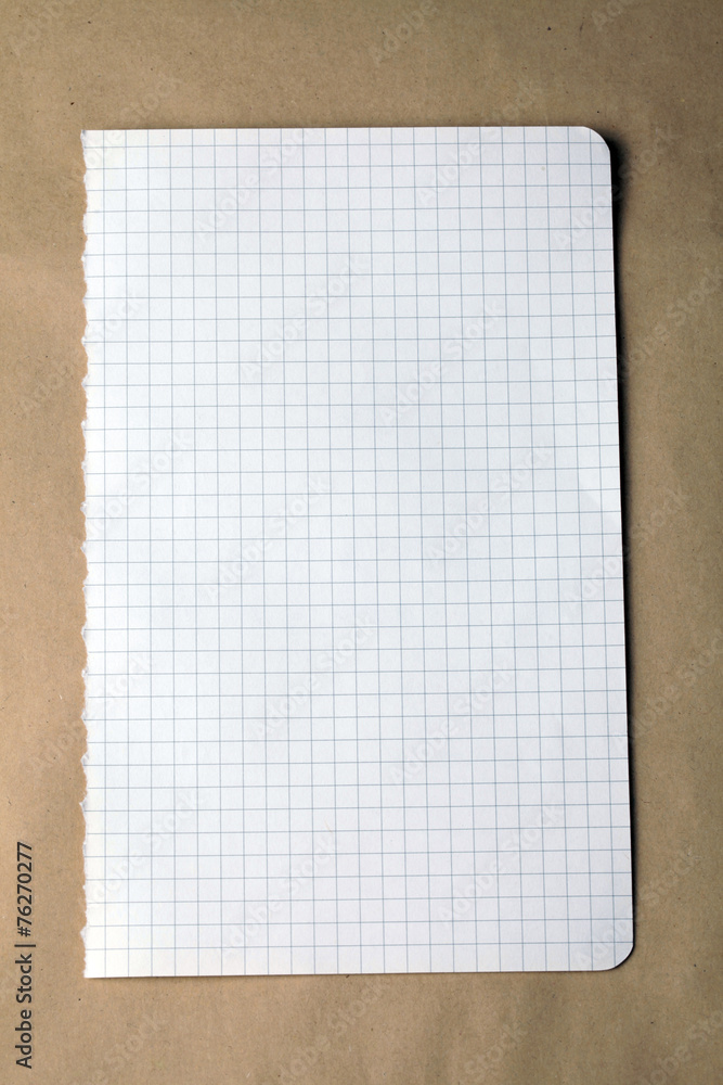 Fototapeta premium checked note on craft paper background