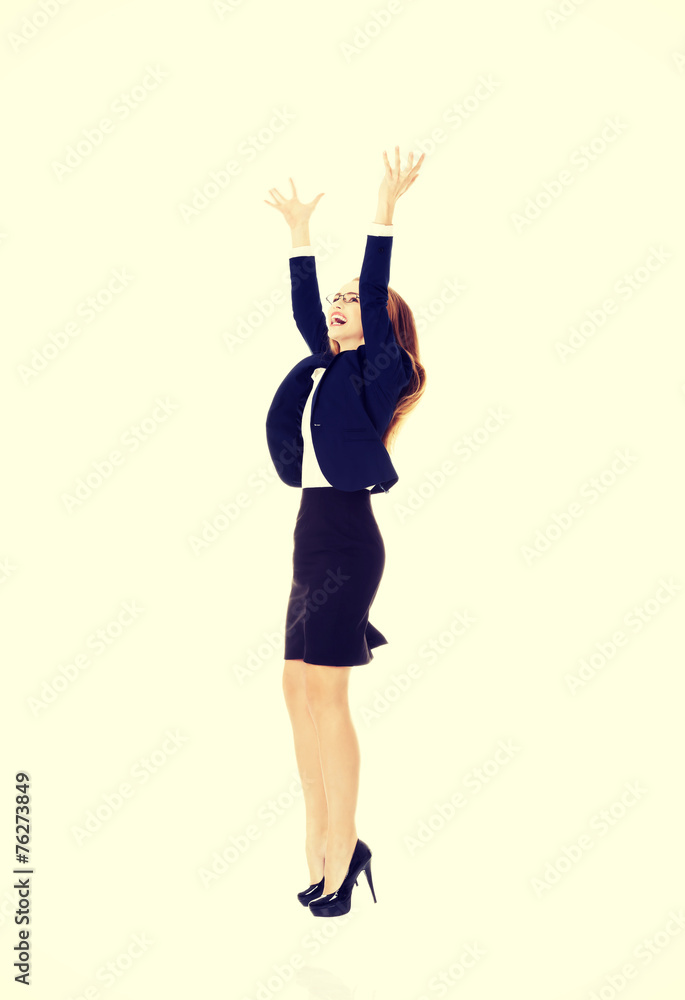 Beautiful businesswoman touching an abstract space Beautiful businesswoman touching an abstract space