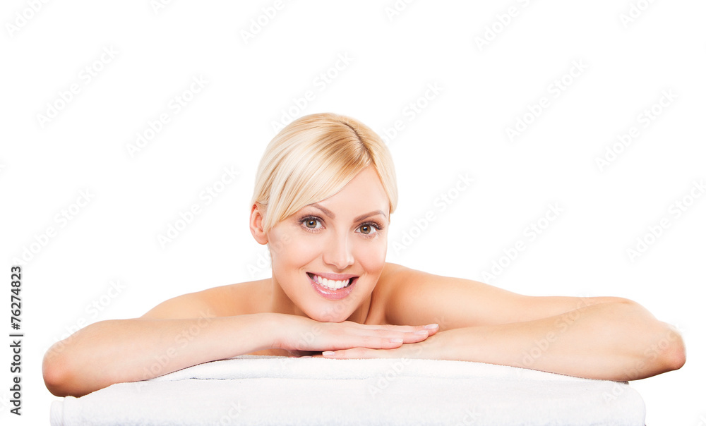 Young beautiful woman relaxing at spa isolated on white Young beautiful woman relaxing at spa isolated on white