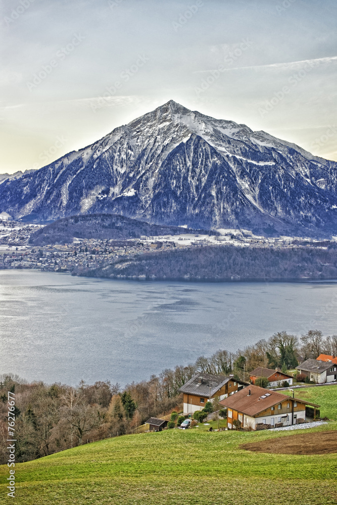 Niesen Mountain and lakeview near Thun lake in Swiss Alps in win