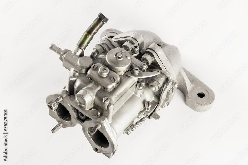 Fototapeta premium The carburetor of the internal combustion engine of the car