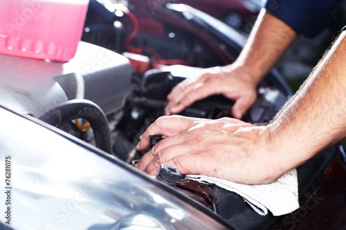 Mechanic working in auto repair garage