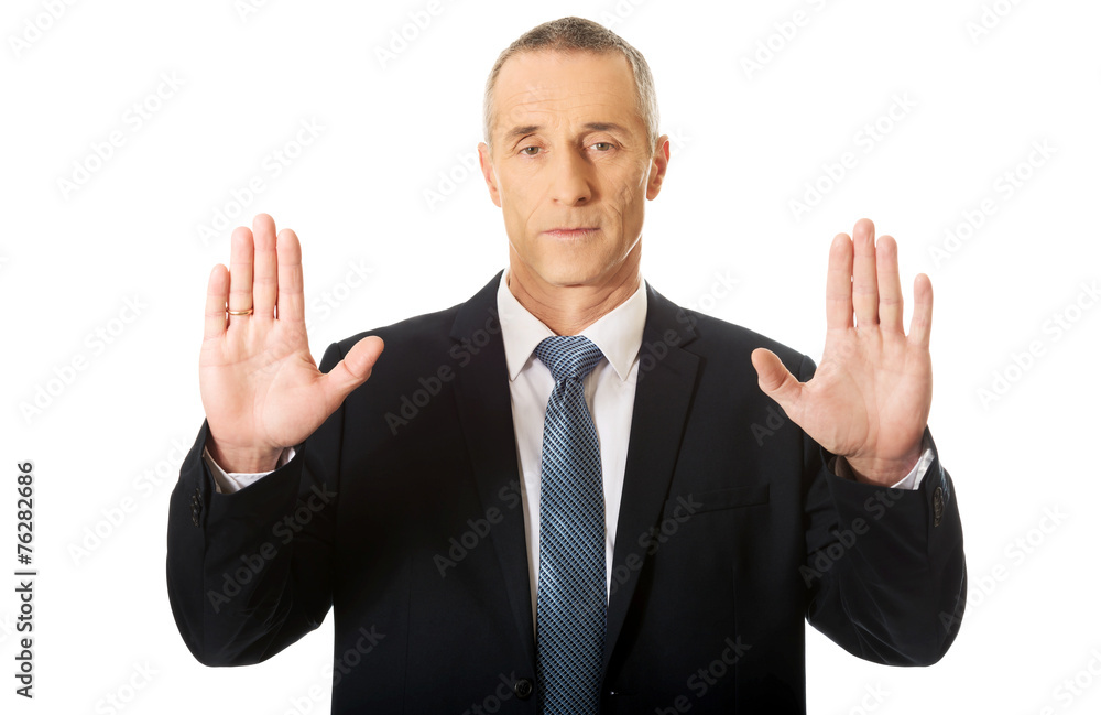 Businessman pressing an abstract touchscreen Businessman pressing an abstract touchscreen