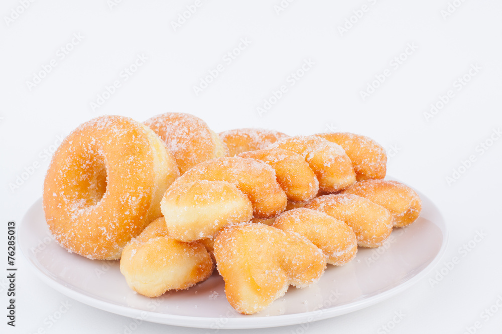 Delicious Sugar Ring Donut with a White paper Background Delicious Sugar Ring Donut with a White paper Background