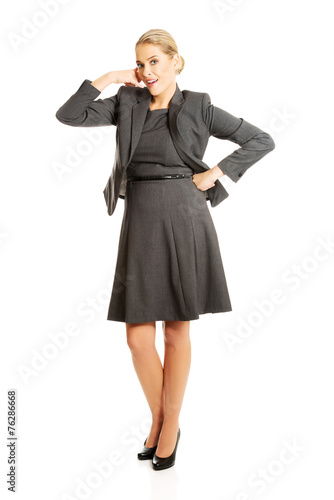 Woman making phone gesture