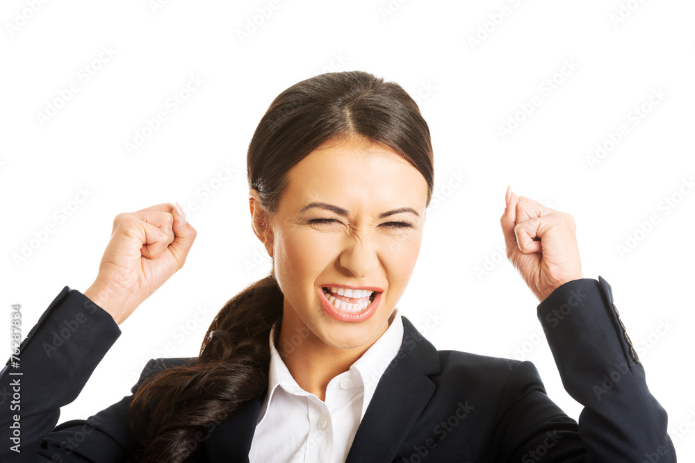 Portrait of angry businesswoman making fists Portrait of angry businesswoman making fists
