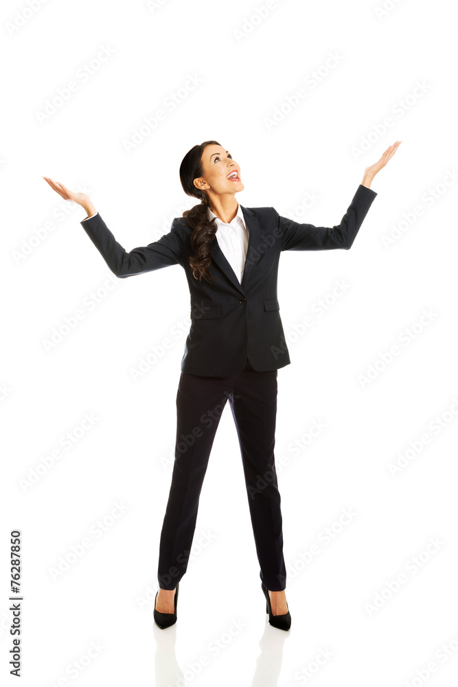 Full length businesswoman holding copyspace Full length businesswoman holding copyspace
