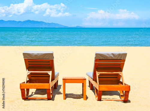 Chairs on the beach near sea