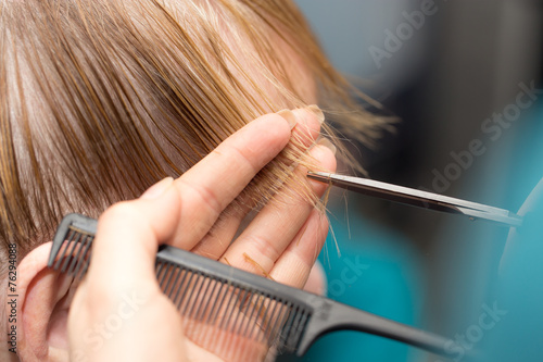 cutting hair in a beauty salon