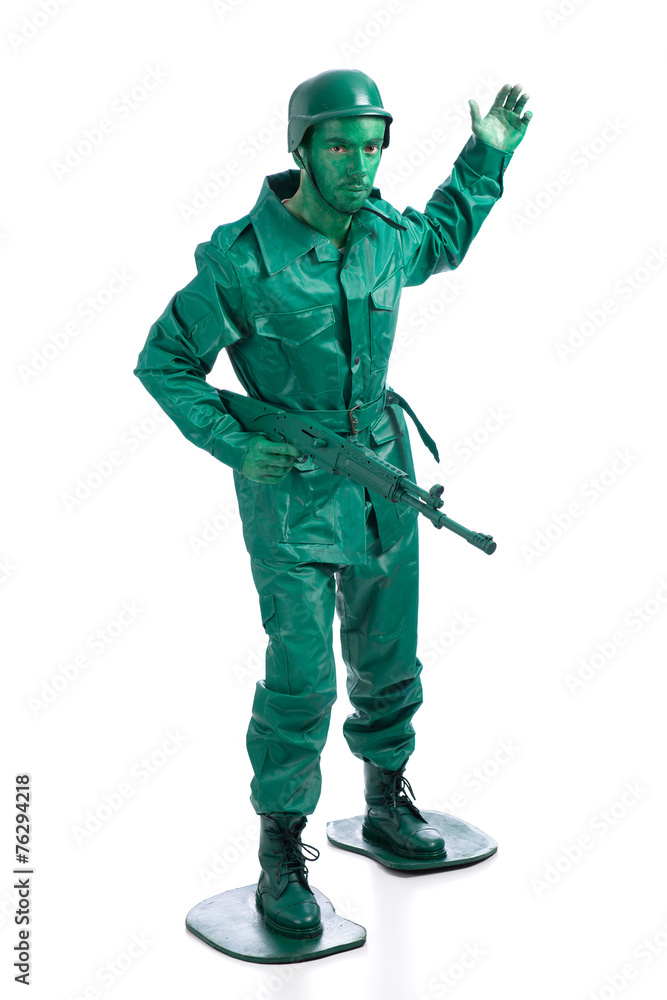 Man on a green toy soldier costume Man on a green toy soldier costume