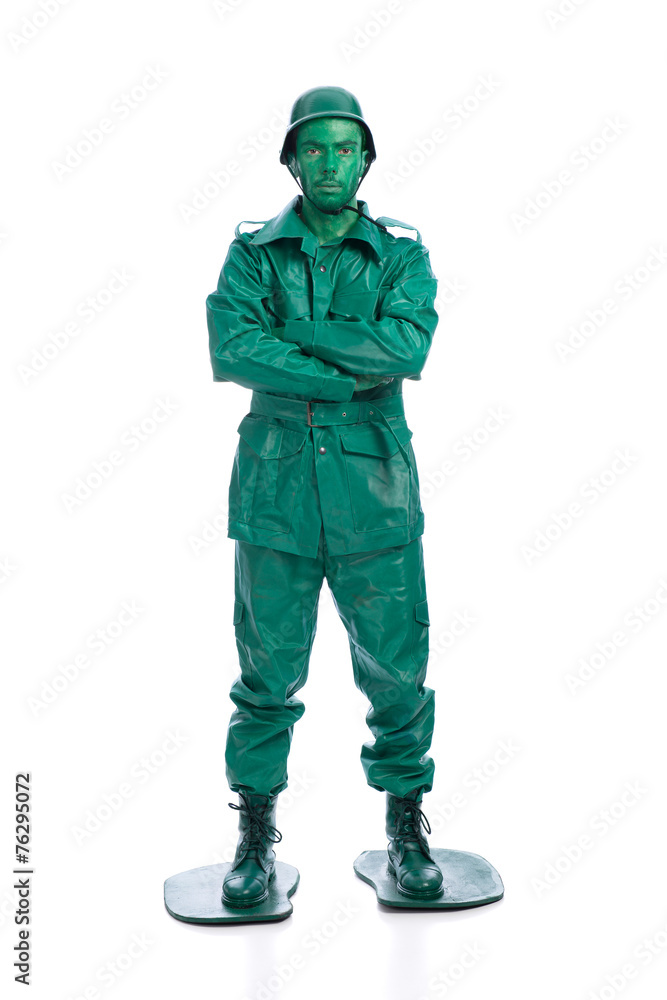 Man on a green toy soldier costume Man on a green toy soldier costume