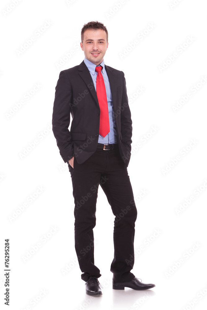 business man holding both hands in his pocket. business man holding both hands in his pocket.