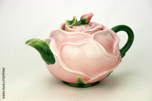 Rose teapot isolated on white background