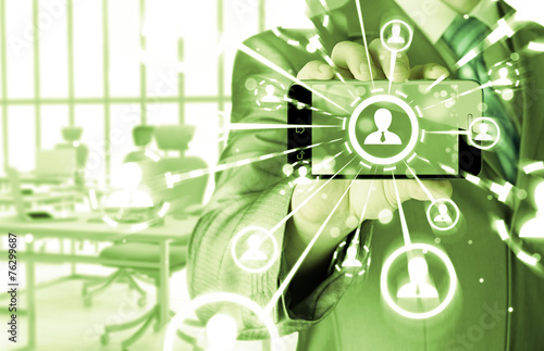 Wallpaper Mural Business Hand holding a phone show the social network Torontodigital.ca