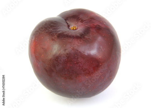 Front view of plum on white background.