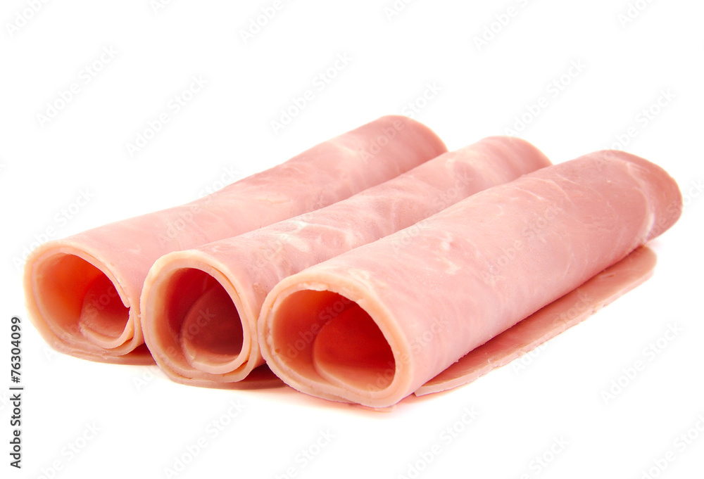 Cooked boiled and rolled ham sausage on white background. Cooked boiled and rolled ham sausage on white background.