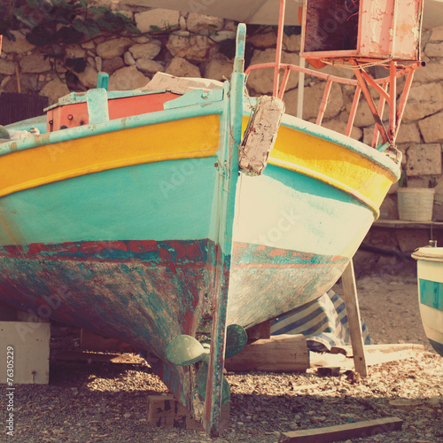 Old boat, abstract vintage background - impressions of Greece