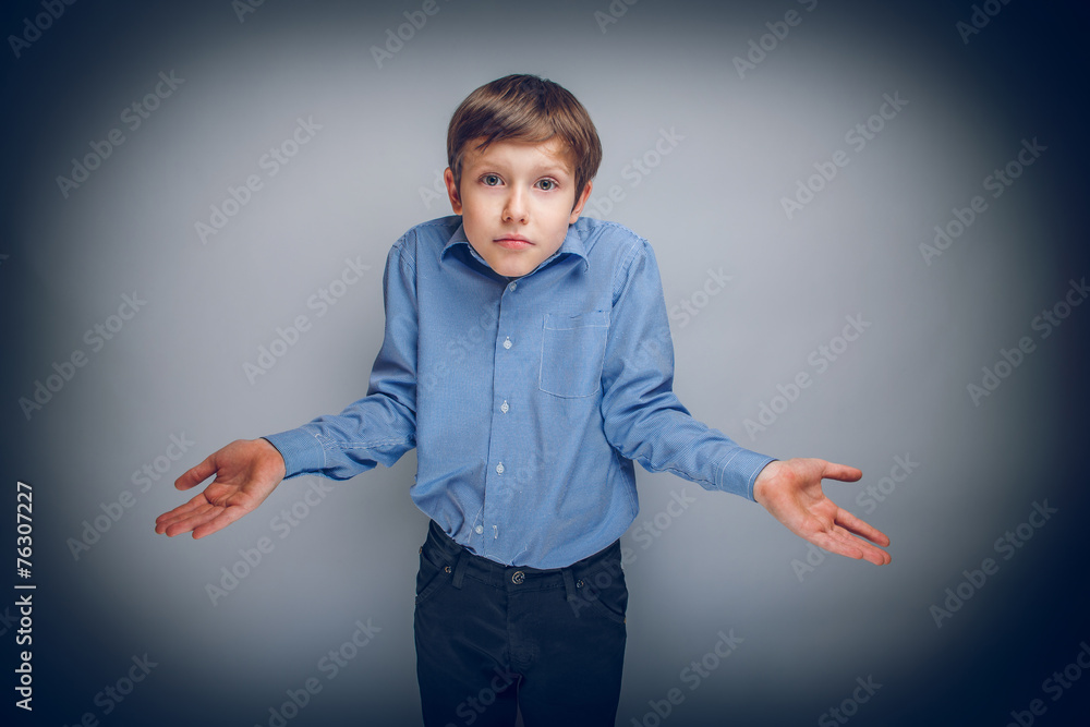 boy teenager of European appearance brown hair threw up his hand boy teenager of European appearance brown hair threw up his hand