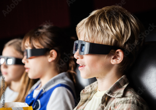 Boy Watching 3D Movie With Siblings