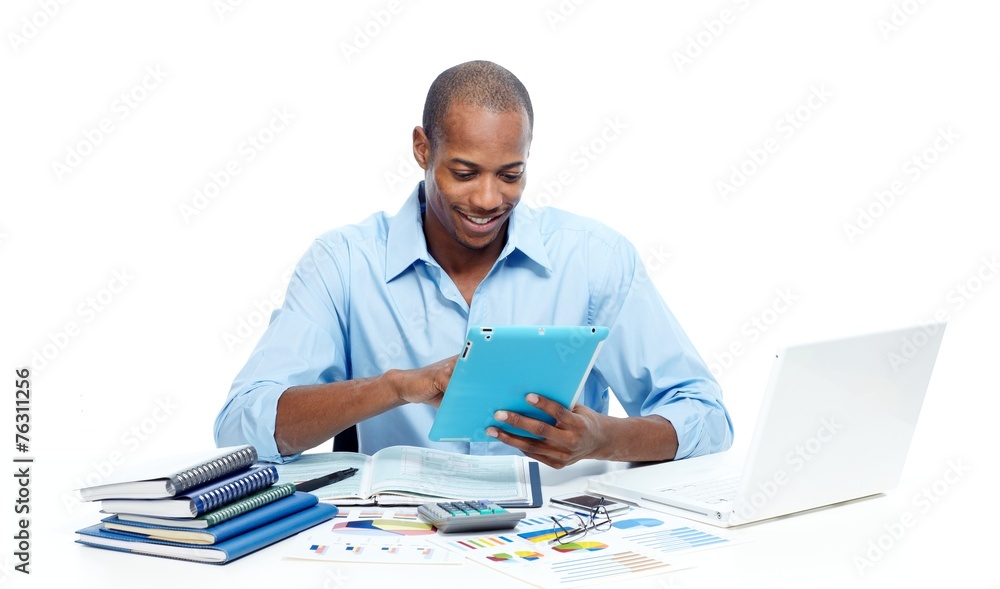 Black man working with tablet computer Black man working with tablet computer