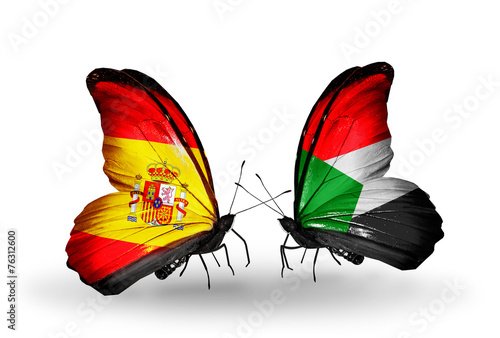Two butterflies with flags Spain and Sudan