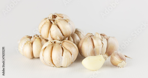 group of fresh garlic on white