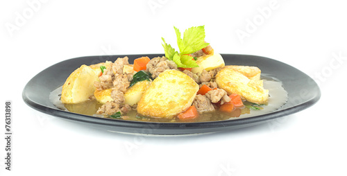 Stir fried tofu with pork and carrot on white