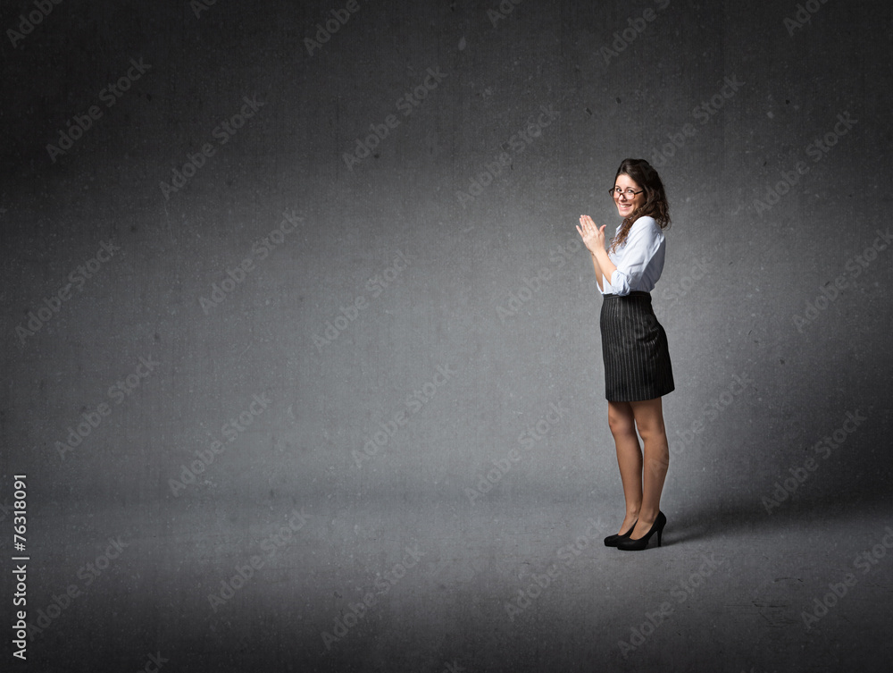 business woman claps hands
