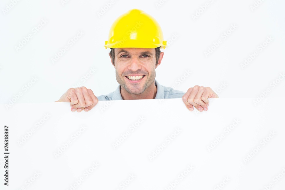 Architect with bill board over white background Architect with bill board over white background